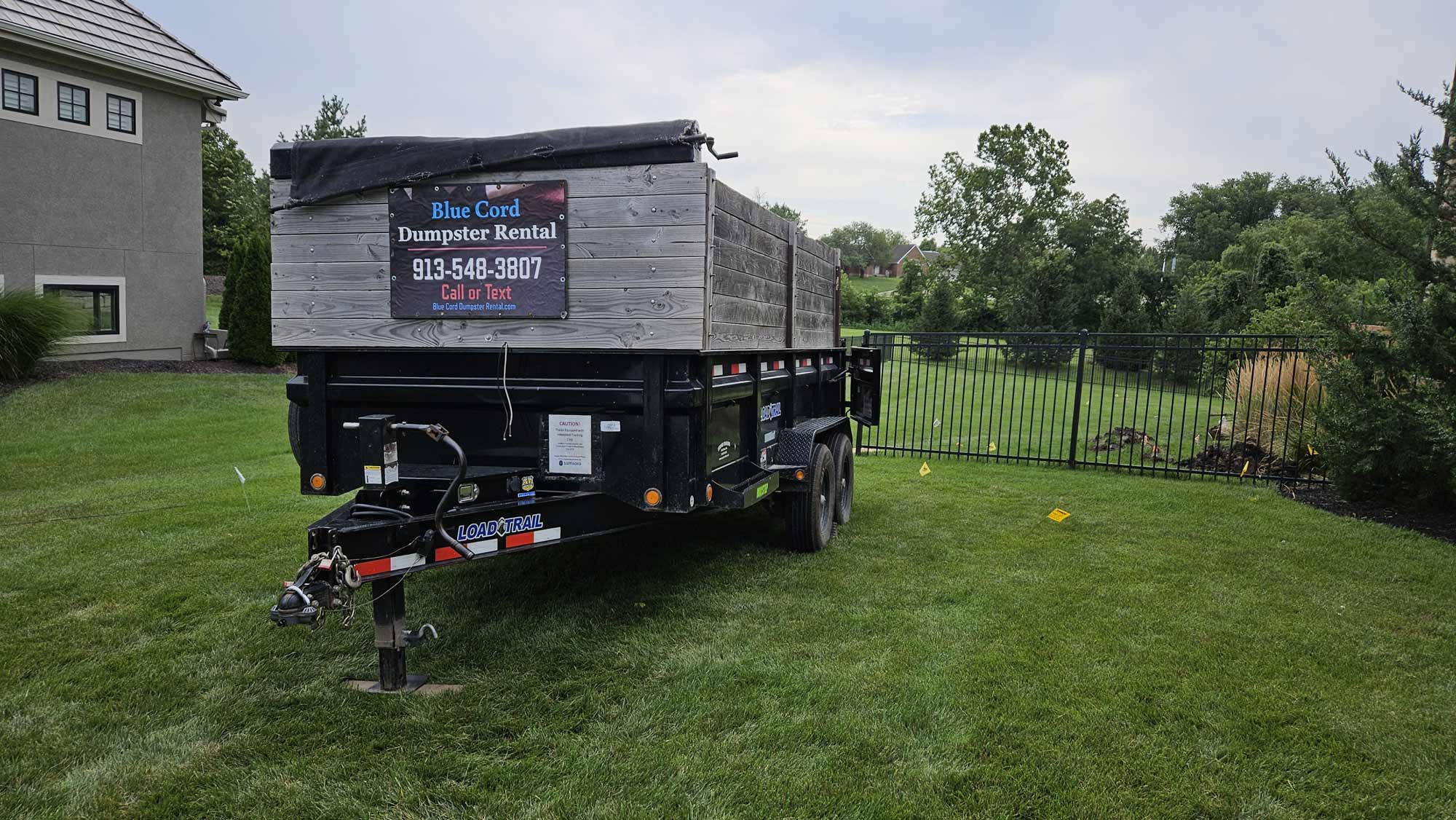 Blue Cord Dumpster Rental Avoiding inground sprinklers 1