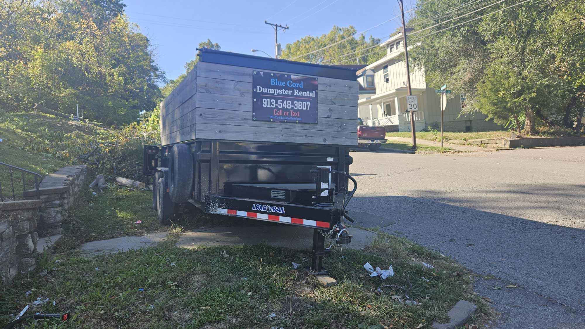 Blue Cord Dumpster Rental Roadside Easement or Curb